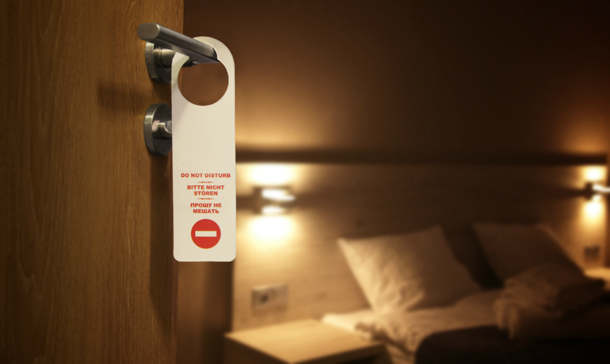 Hotel Room, do not disturb sign. SkyLuxTravel Blog. SkyLux - Discounted Business and First Class Flights
